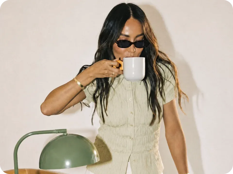 A woman enjoying a coffee