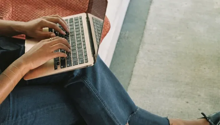 Laptop on a woman’s lap