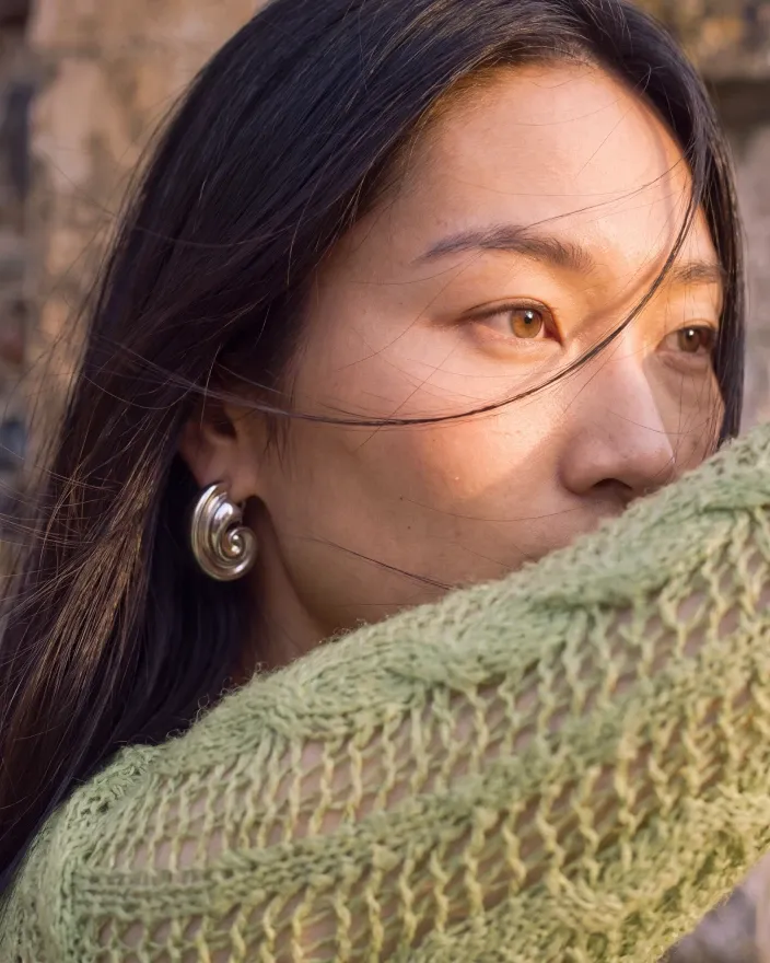 Woman wearing a green cardigan